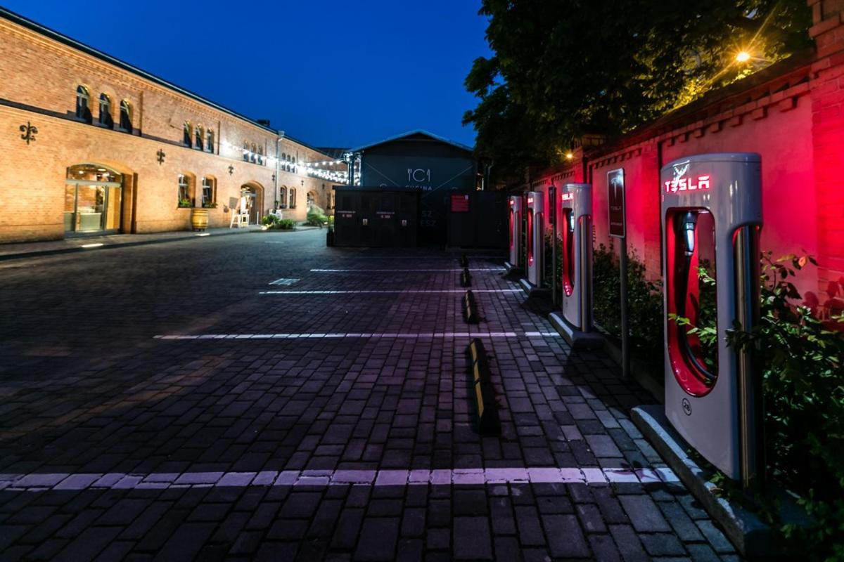 City Park Hotel & Residence Poznan Bagian luar foto Tesla Supercharger in Warsaw, Poland