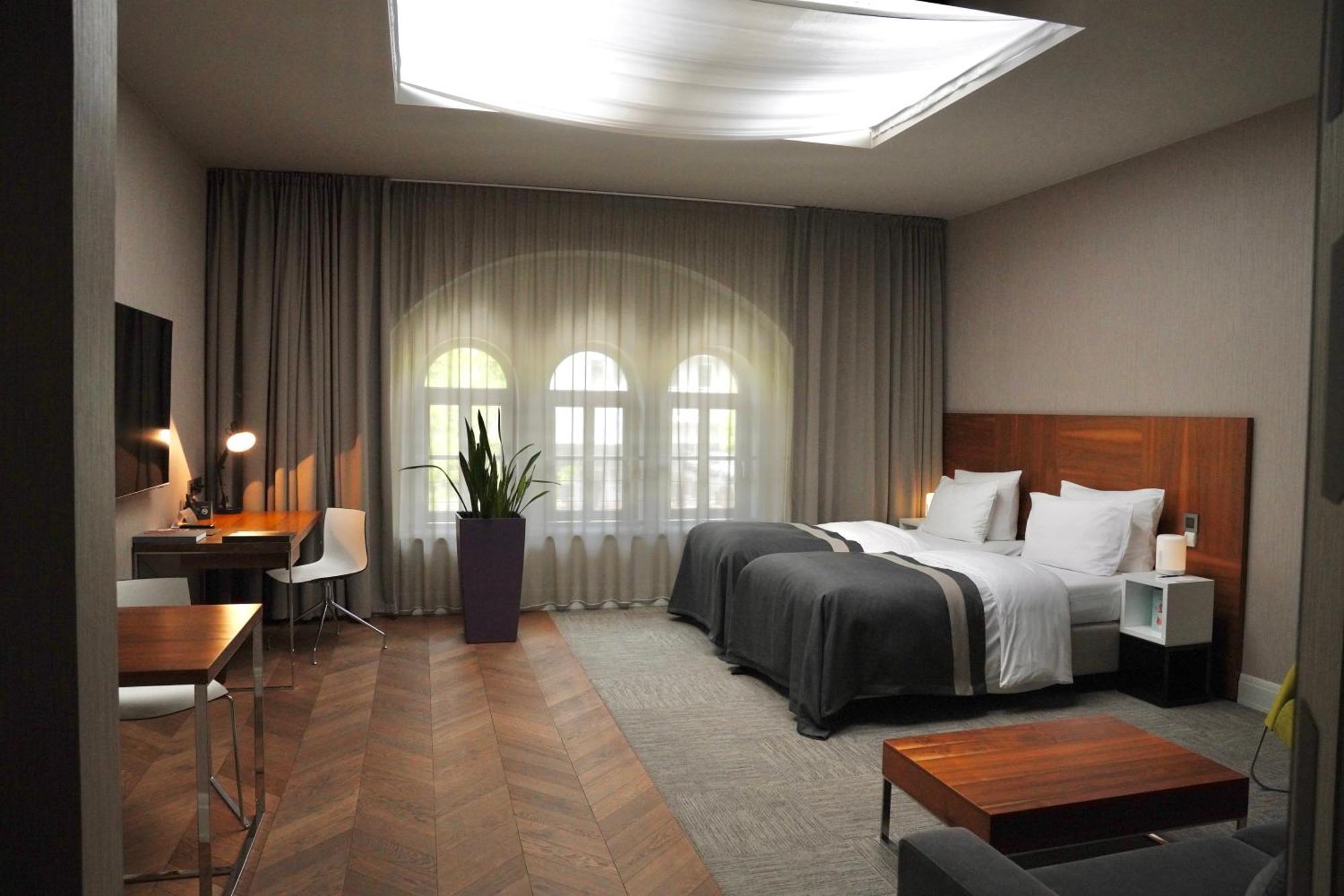 City Park Hotel & Residence Poznan Bagian luar foto A room at the hotel